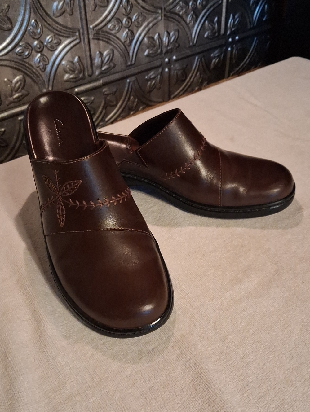 Clarks Brown Leather Slip-On Women's Clogs with Stitched Detail